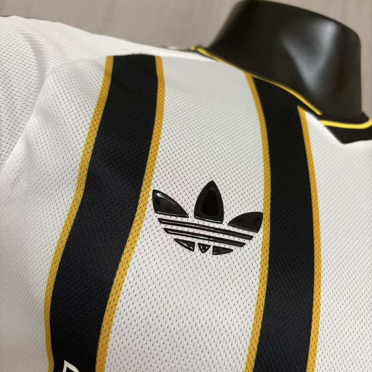 Boca Juniors player version soccer jersey 2026/27 in black and white stripes with gold trim - view 7