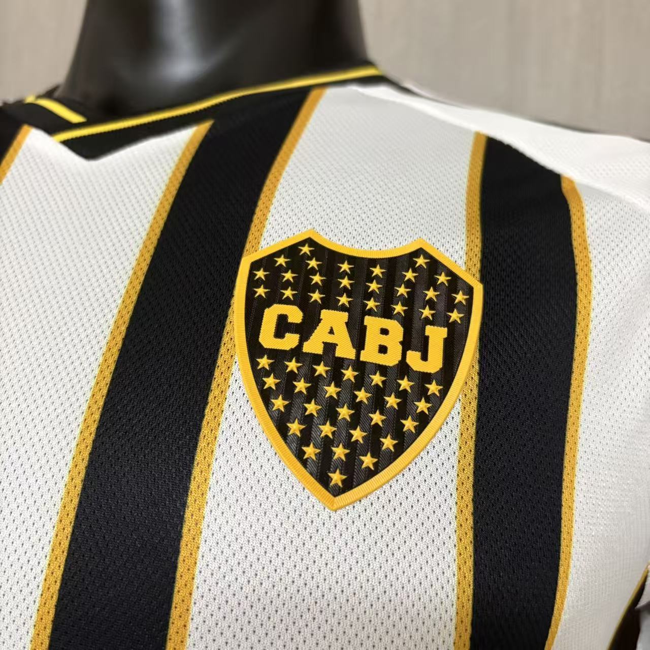 Boca Juniors player version soccer jersey 2026/27 in black and white stripes with gold trim - view 6