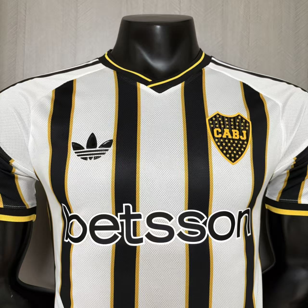 Boca Juniors player version soccer jersey 2026/27 in black and white stripes with gold trim - view 8